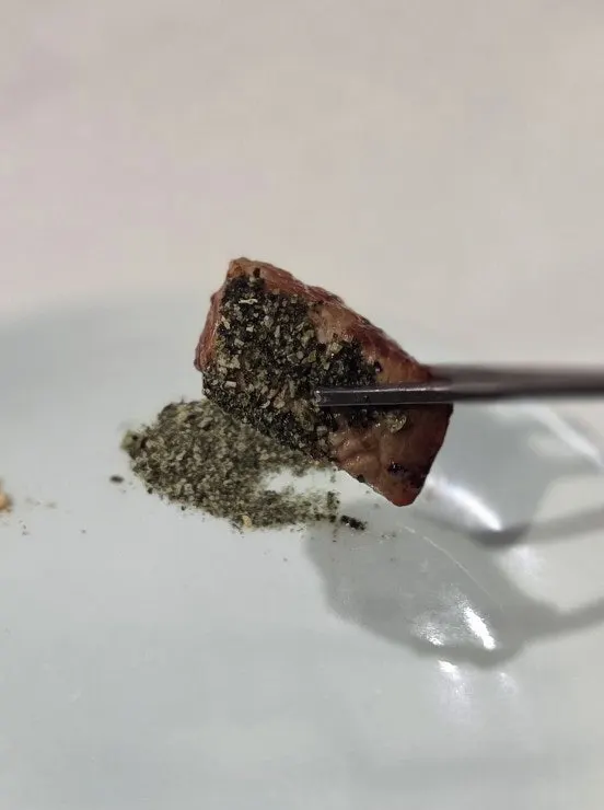 A piece of nuruk pork neck grilled golden brown