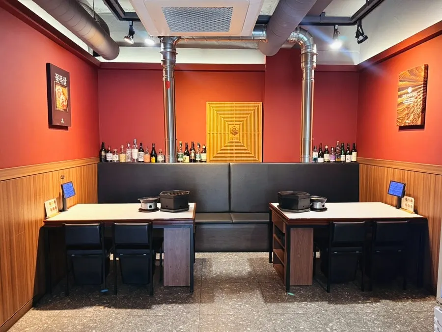 View of the Sanseong Meat Shop dining hall arranged with steel and glass