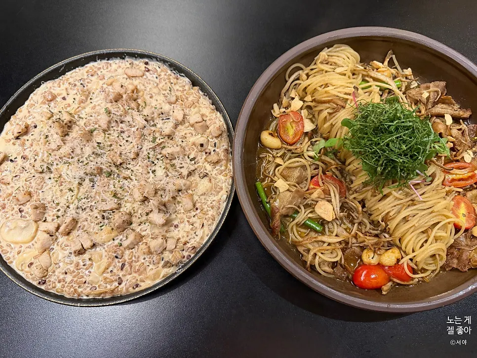 Table spread of countryside oil pasta and sous vide sirloin cream risotto