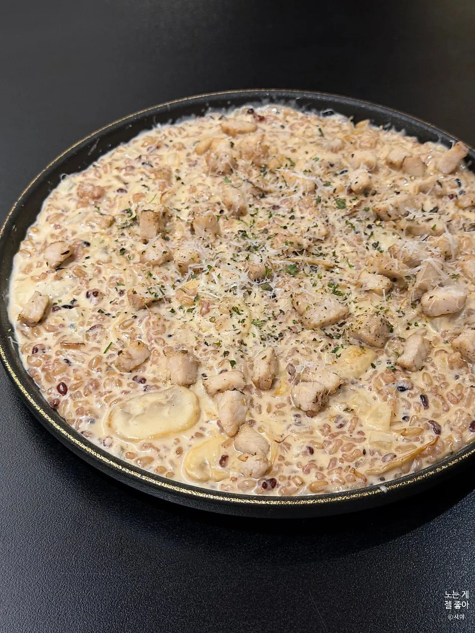 Cream risotto topped with sous vide sirloin