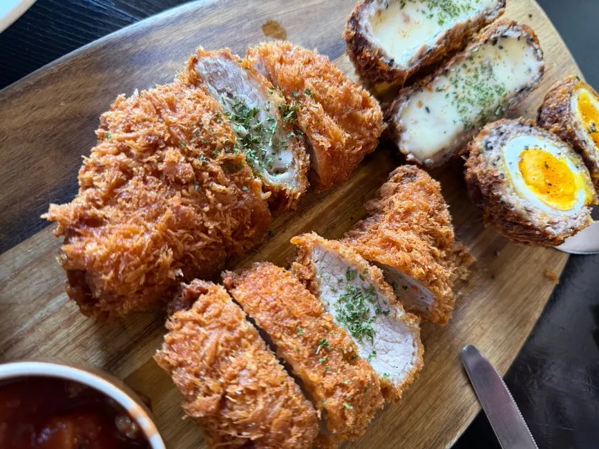 Tonkatsu sauce and salsa sauce served with the katsu