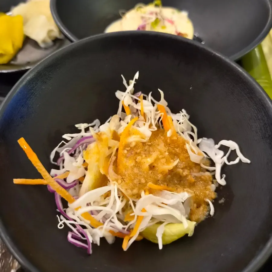 Salad served during the sushi meal