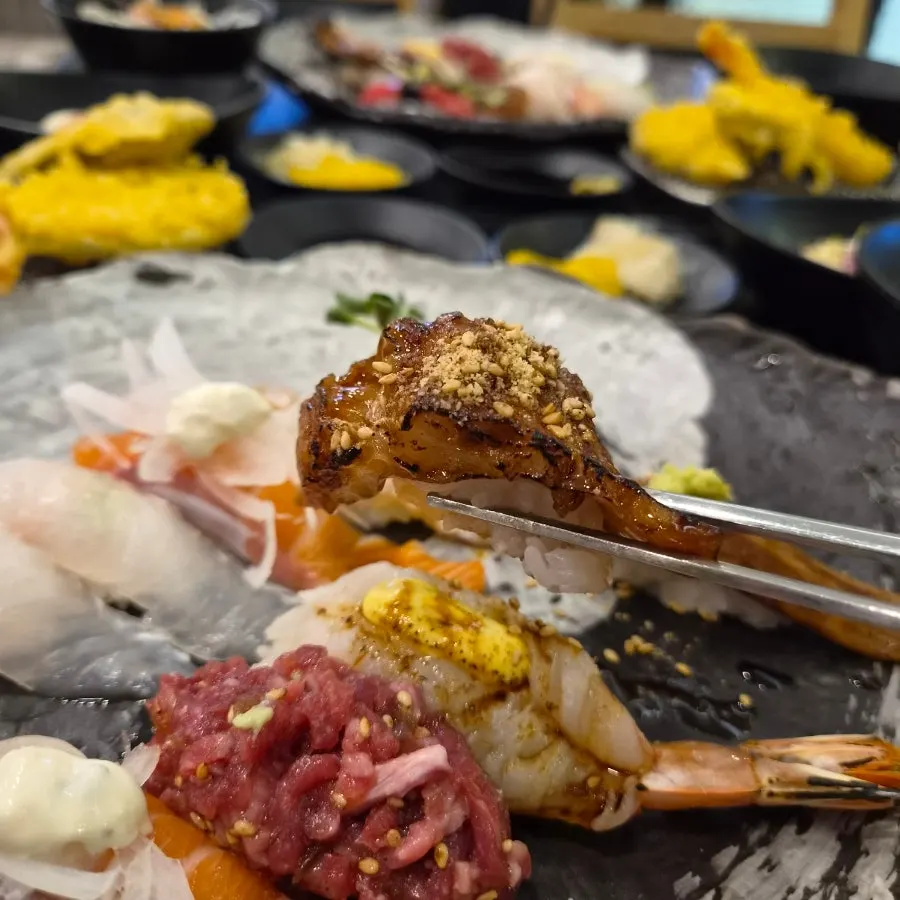 Yukhoe sushi in the assorted sushi selection