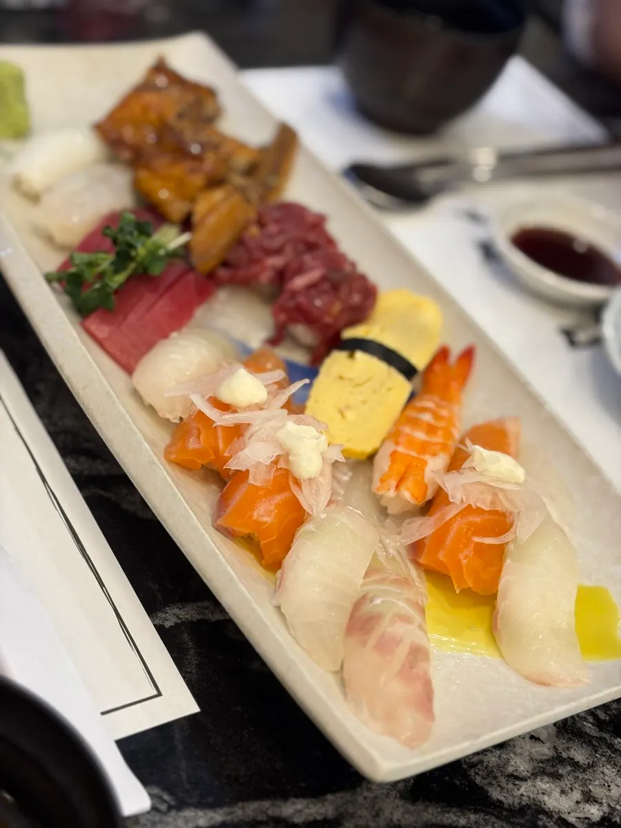 Sushi sets arriving one by one