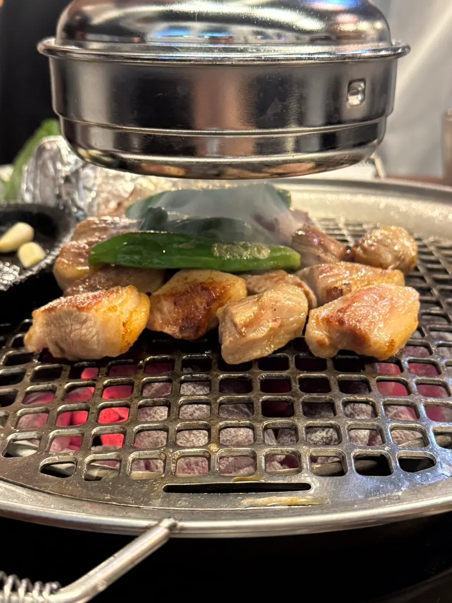 Close-up of thick-cut gabrisal cooking on the grill