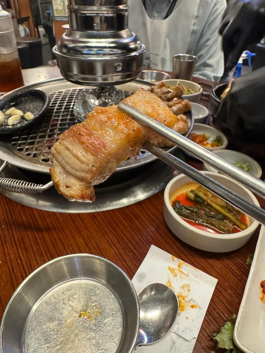 Grilled pork belly served on a plate