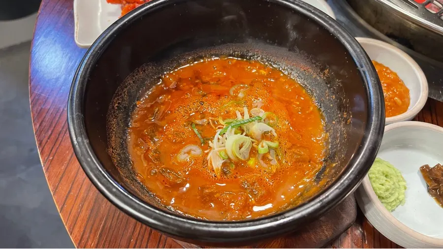 Chadol doenjang hot pot bubbling in a stone pot