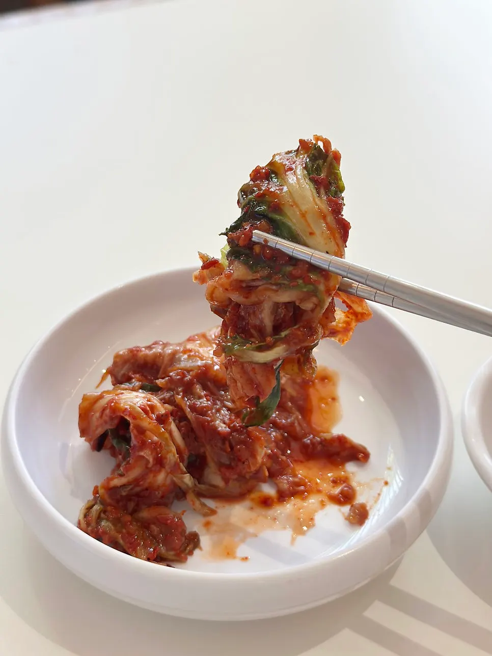 Kimchi scooped onto a plate