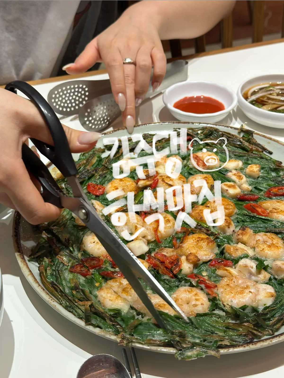 Full table spread at Donggok Jemyeon, a Korean restaurant in Gyodong, Daegu