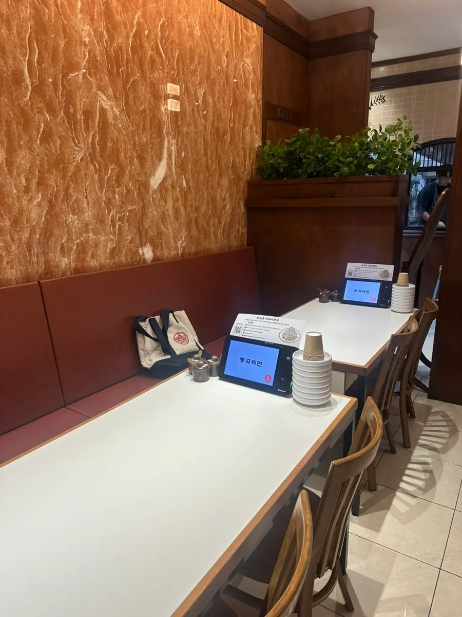 Sofa seating and tables at Donggok Jemyeon