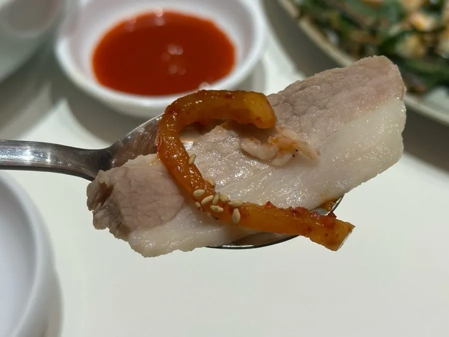 A piece of gabrisal suyuk dipped in doenjang