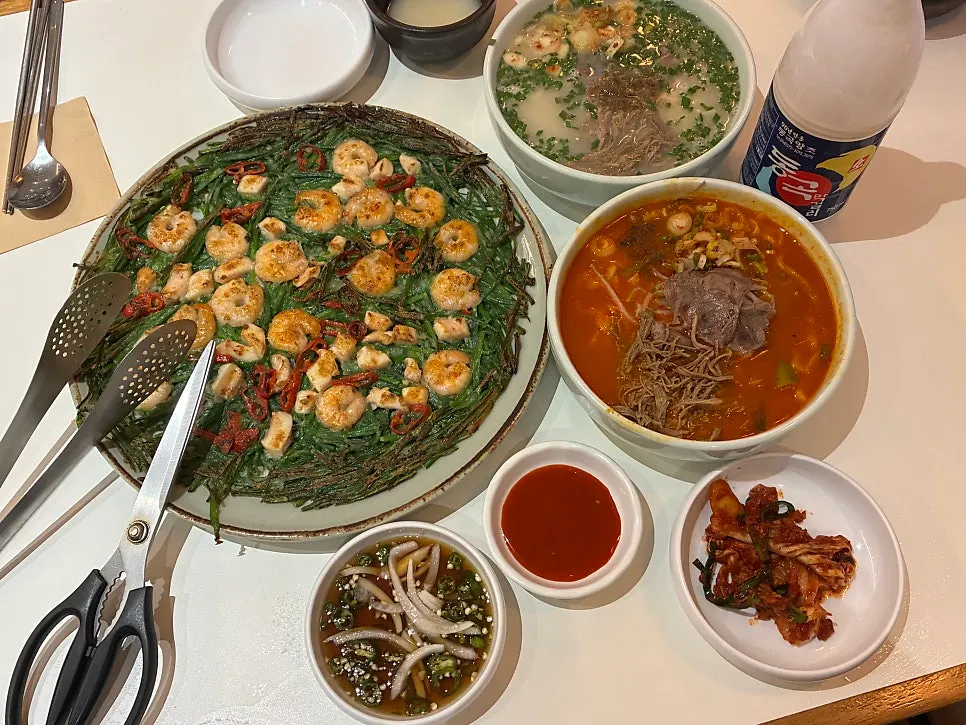 Seafood chive pancake topped with shrimp and squid