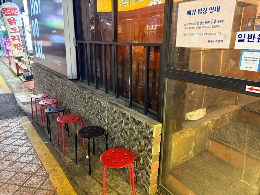 Waiting chairs set up outside the restaurant