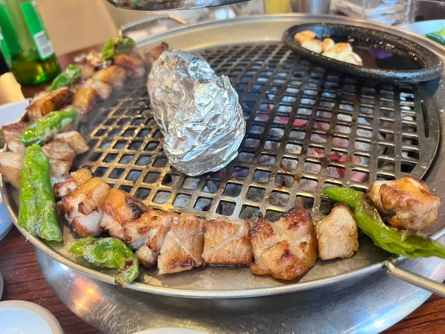 Golden-brown grilled flower pork jowl at Dongnaejeong