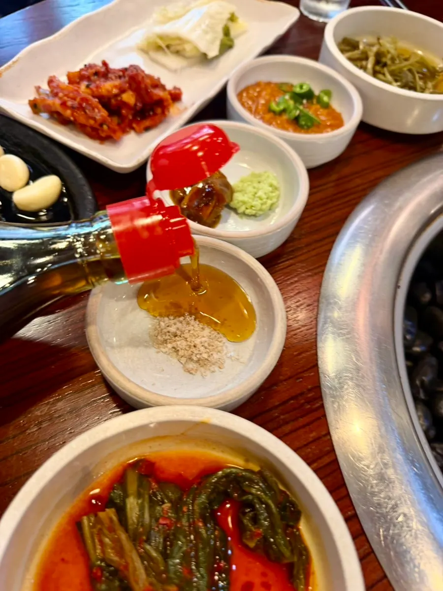 Sesame oil and shiitake salt on the table