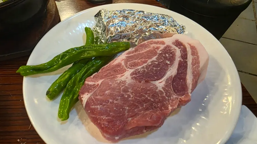 Raw dongnae pork neck and jeong gabrisal spread