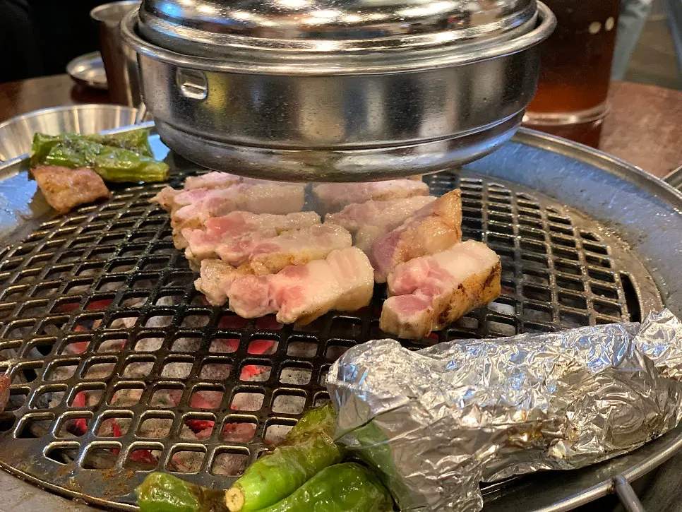 Whole pork belly on the grill