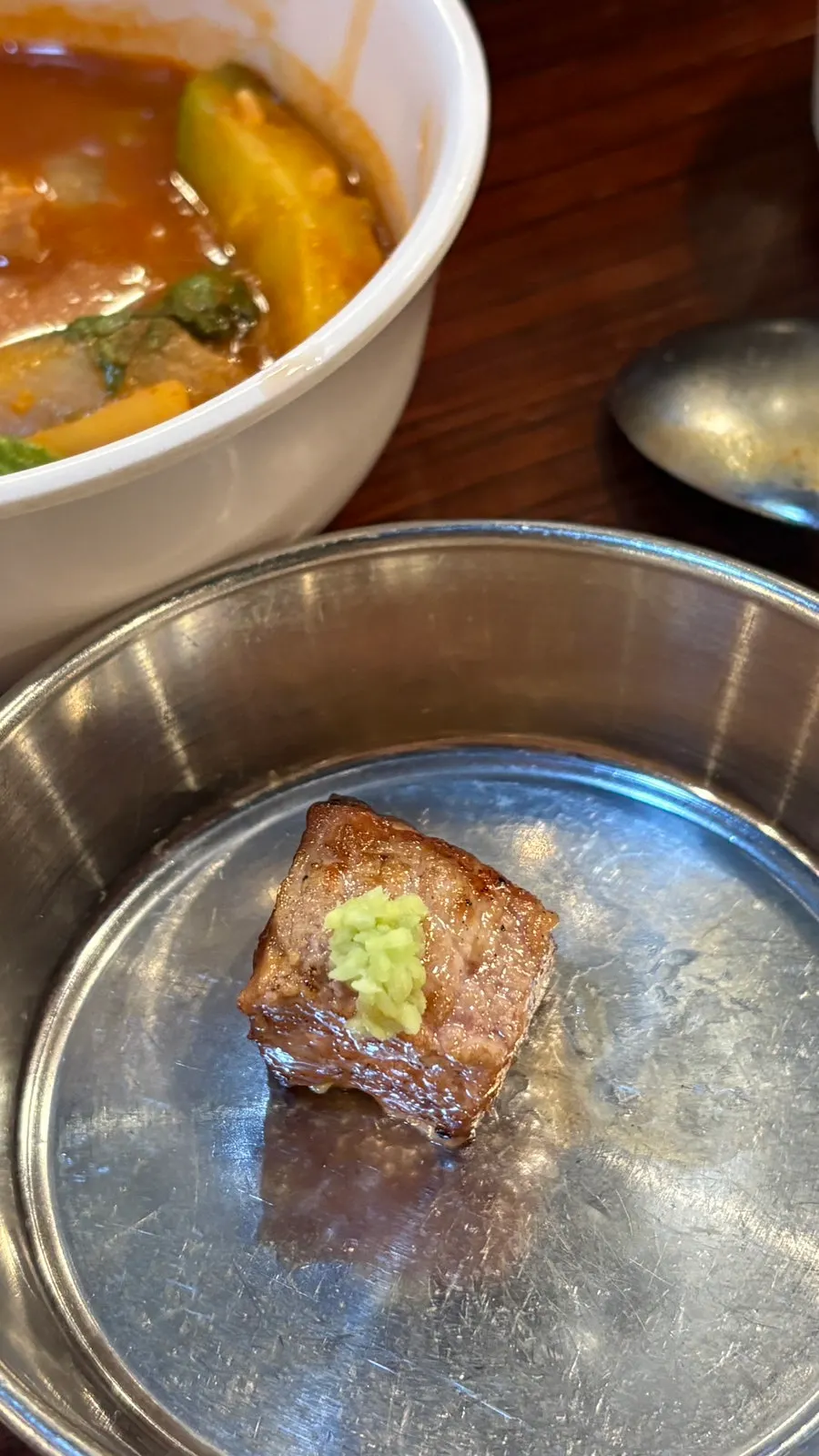 Pork neck and side dishes on the grill