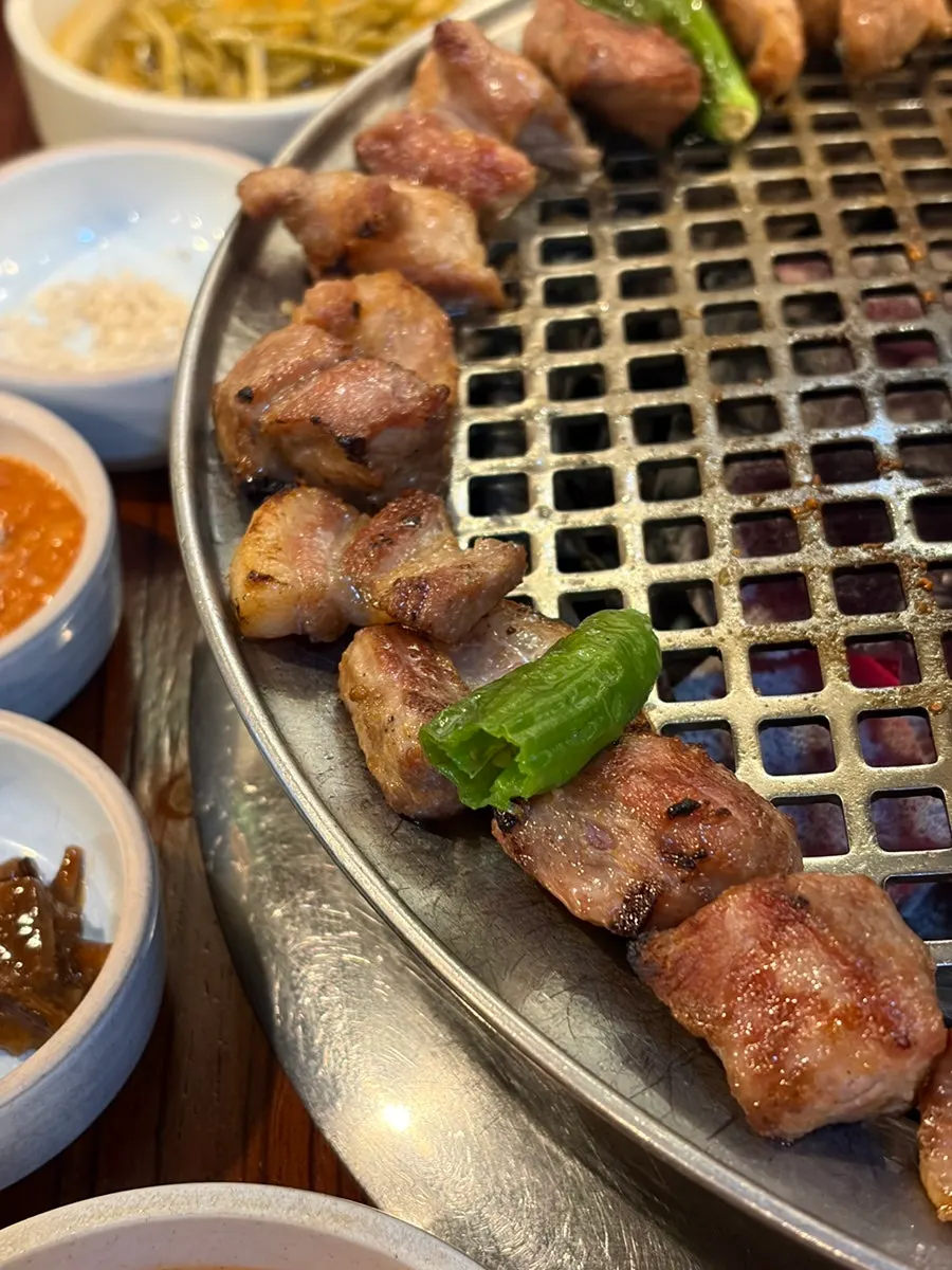 Dongnaejeong pork neck dipped in melchorim sauce