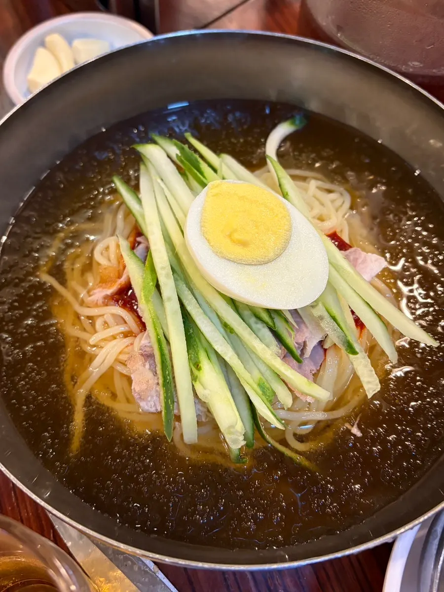 A bowl of milmyeon noodles ordered to finish the meal