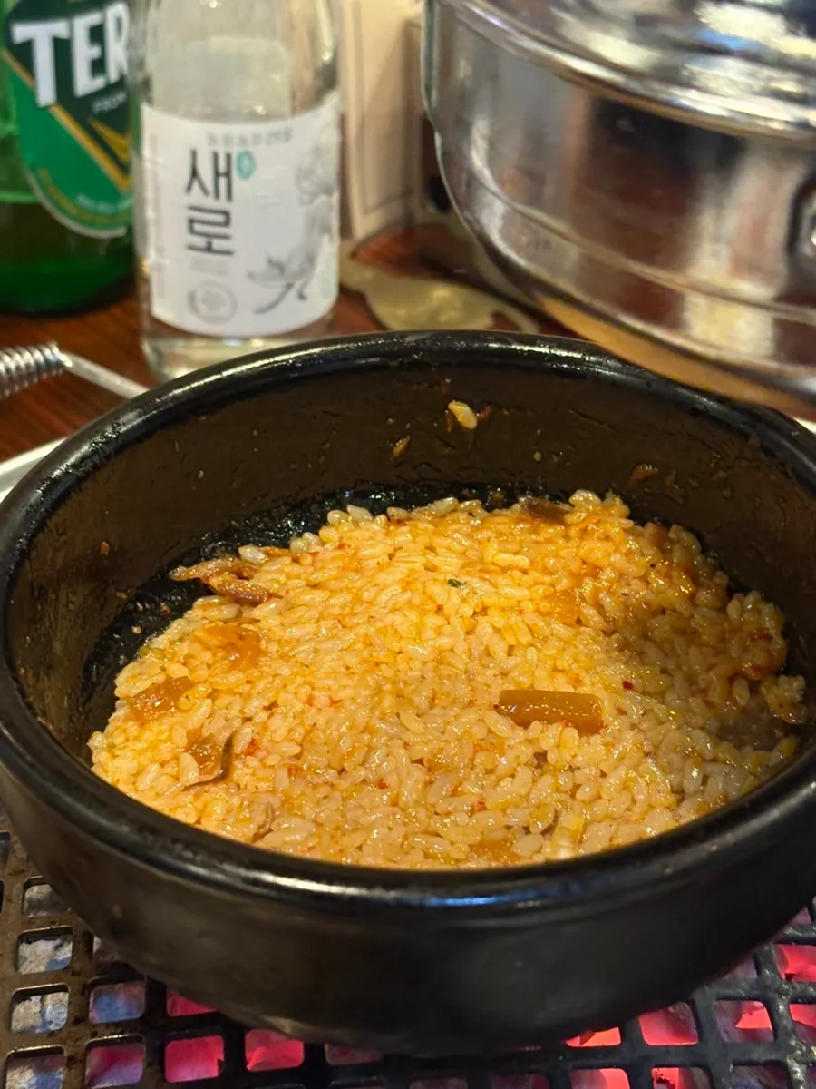 Staff mixing rice into the melchorim sauce