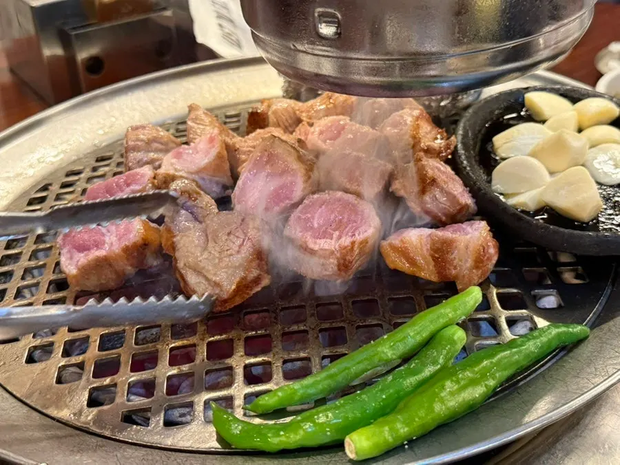 Cross-section of pork, browned outside and juicy inside