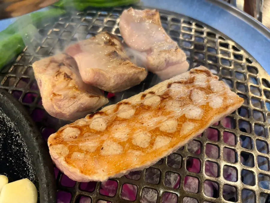 Whole pork belly slab on the brazier