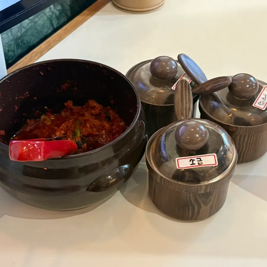 Kimchi container and salt and pepper set on the table