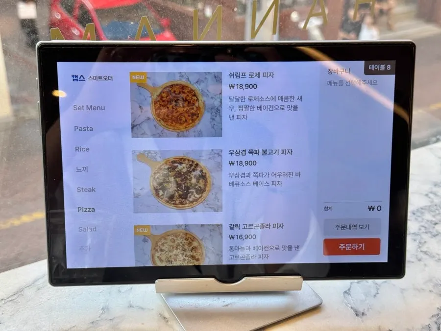 Menu guide reviewed before ordering at Palette Hannam