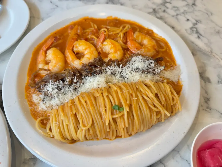 A plate of beef brisket mala rosé pasta