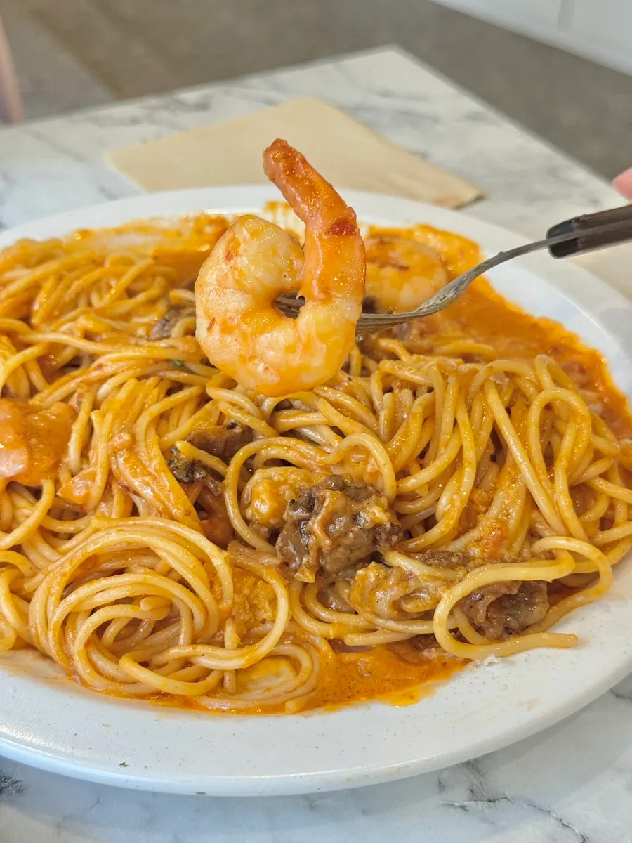 Close-up of the mala rosé pasta with beef brisket and shrimp