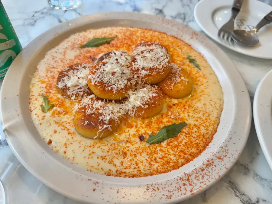 A plate of cream cheese gnocchi