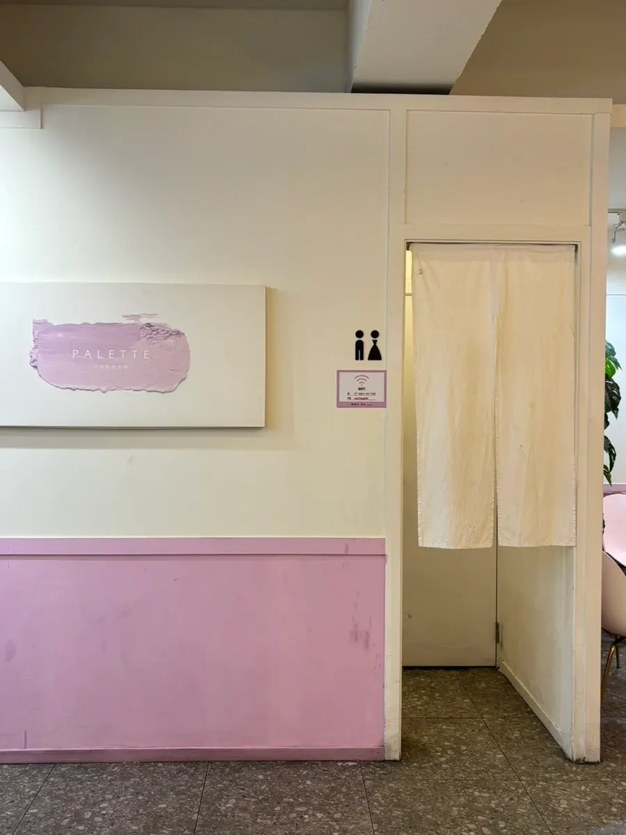 Hallway leading to the restroom at Palette Hannam