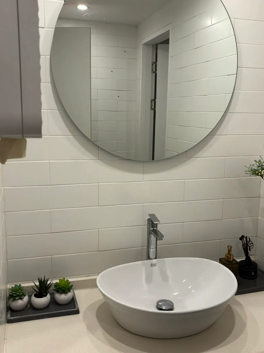 Restroom sink with hand wash and paper towels