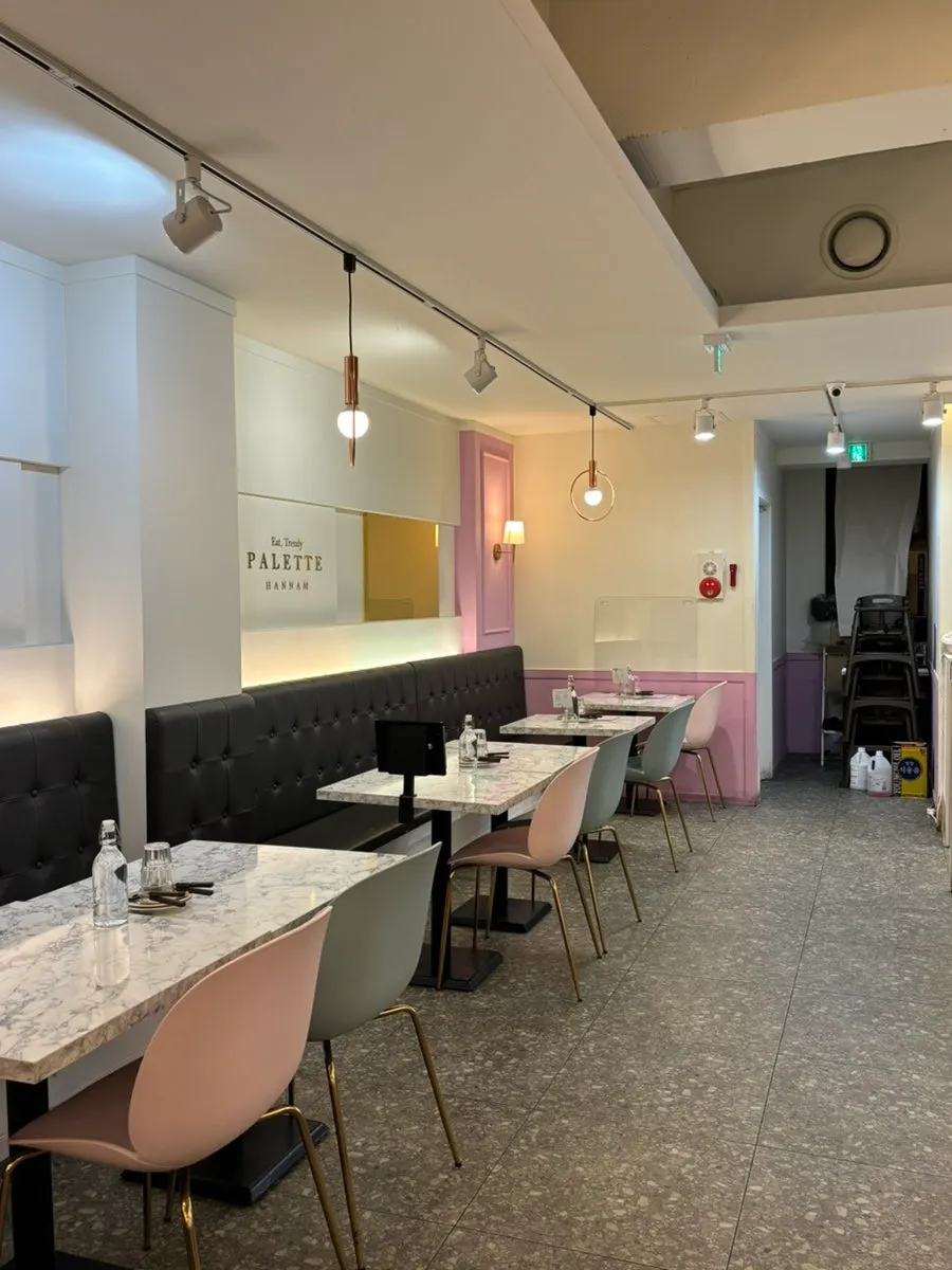 Table seating with pink interior design, great for a date