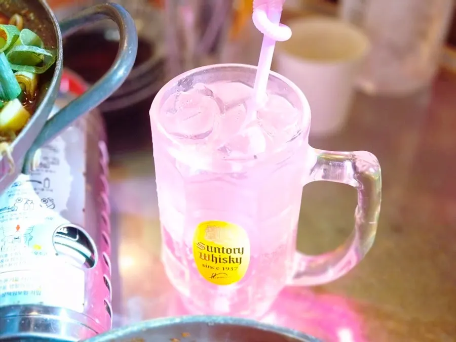 A cocktail-style glass of Room Pojangmacha's X-bomb
