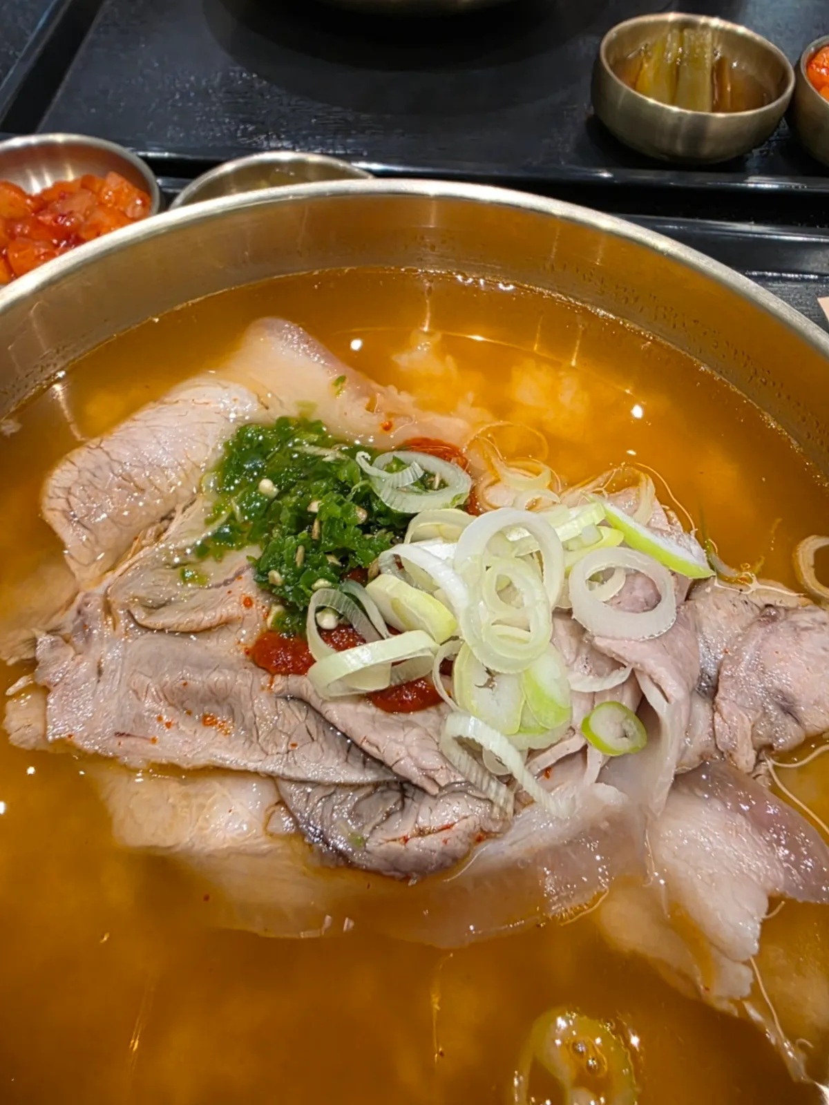 Hearty pork gomtang served with rice