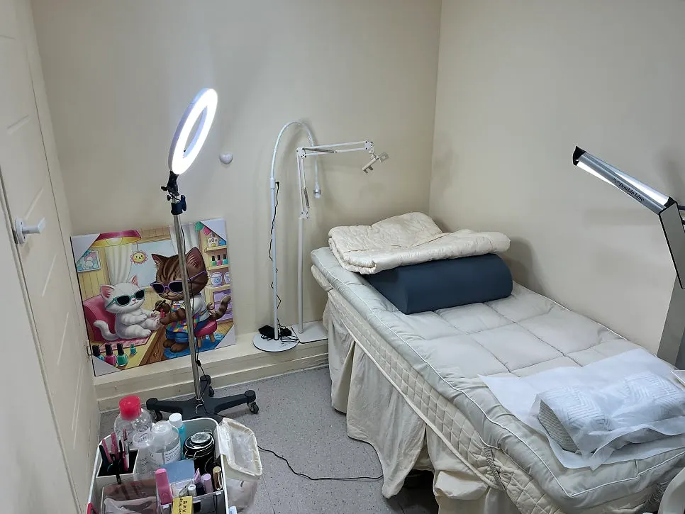 Bright and cozy interior of the Onyu Lash treatment room