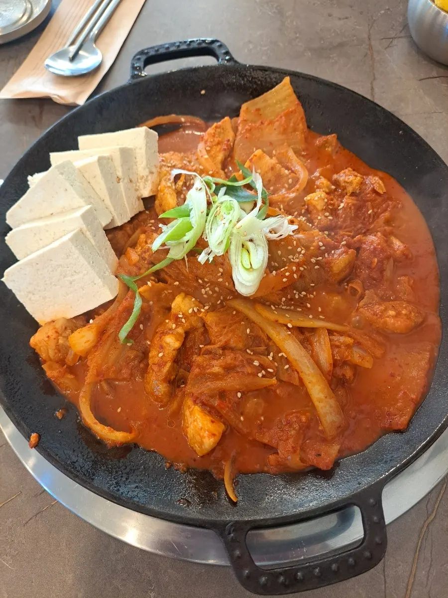 Full spread of the samgyeop kimchi jjim set