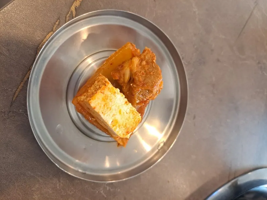 The kimchi jjim pot finished down to the broth