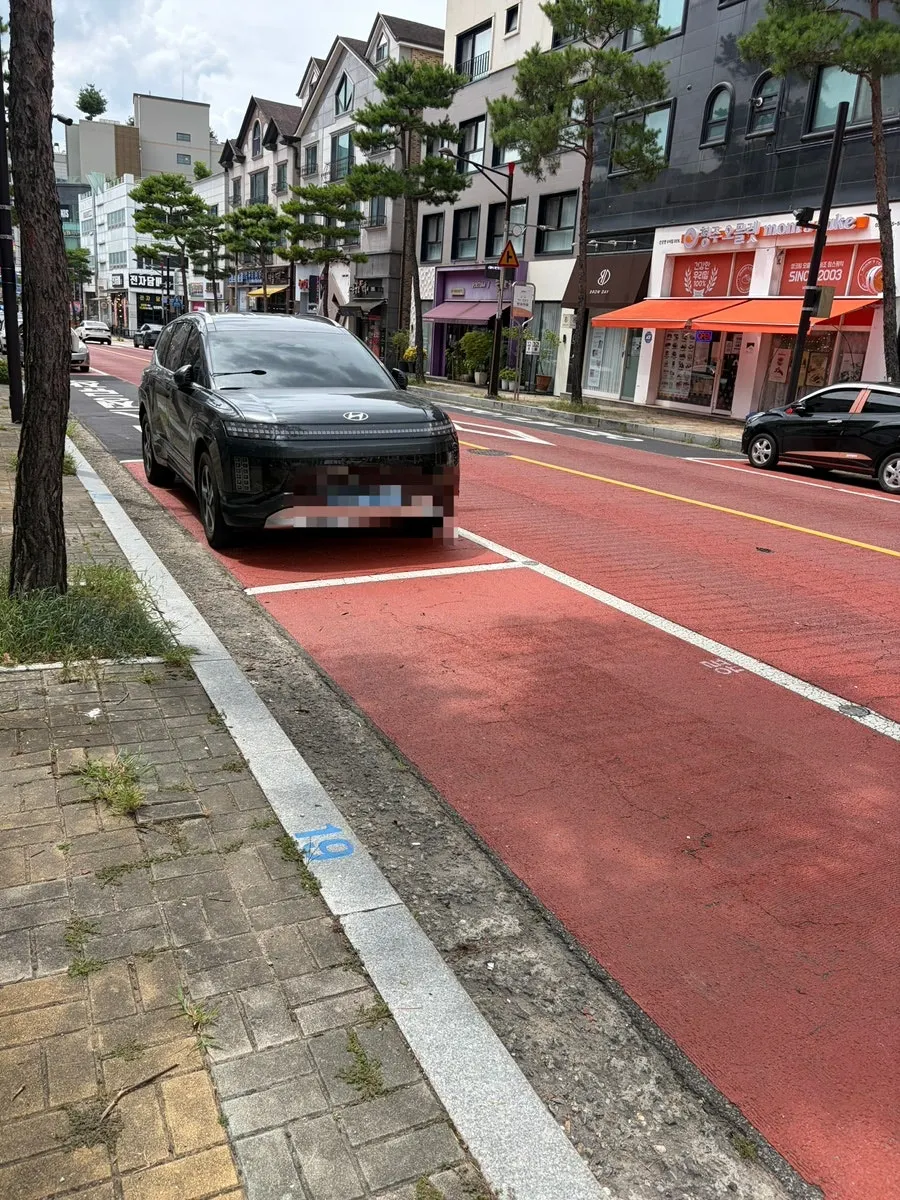 Street public parking lot right in front of Green Nail