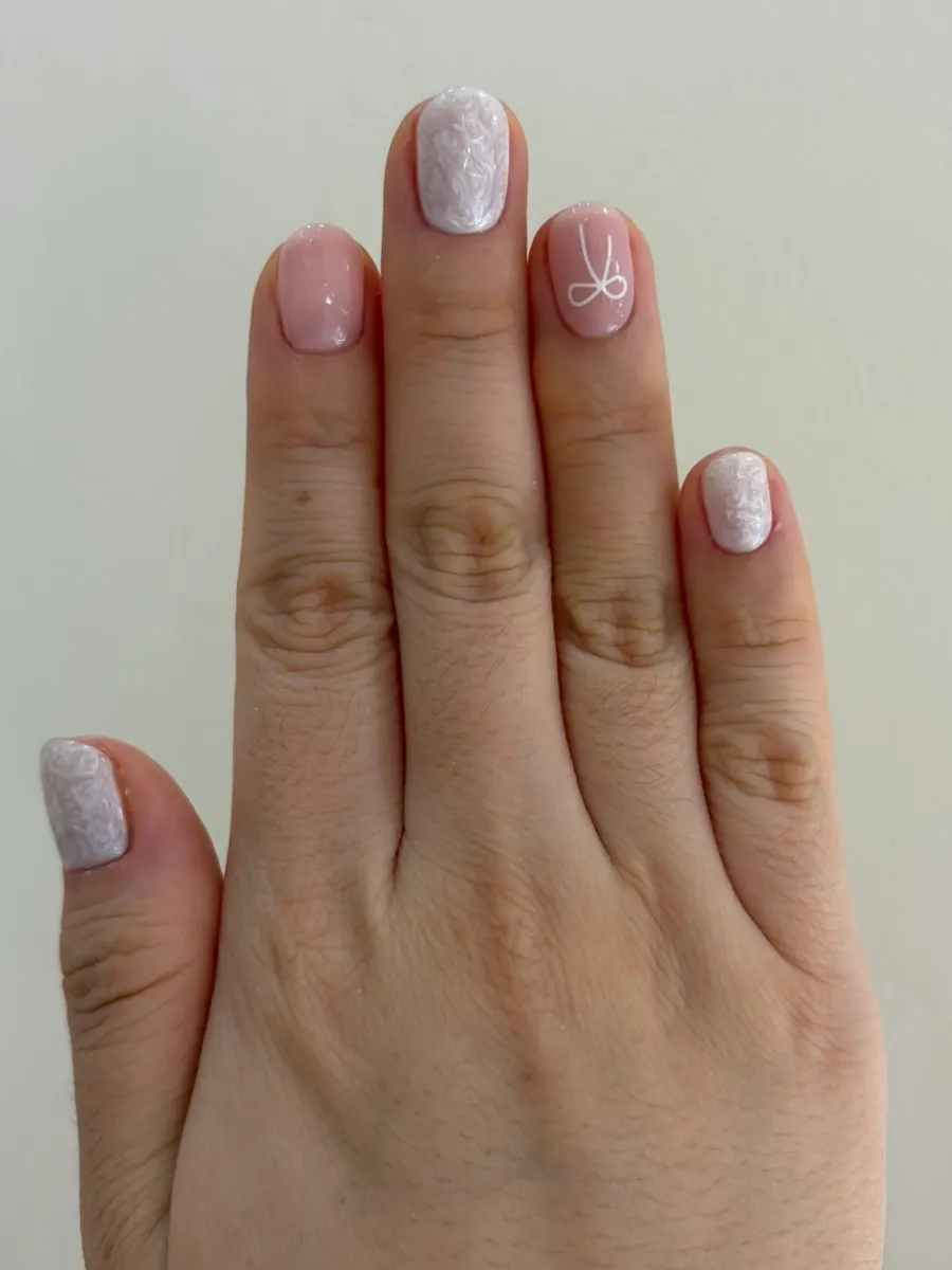 Sparkling finished pink gel nails