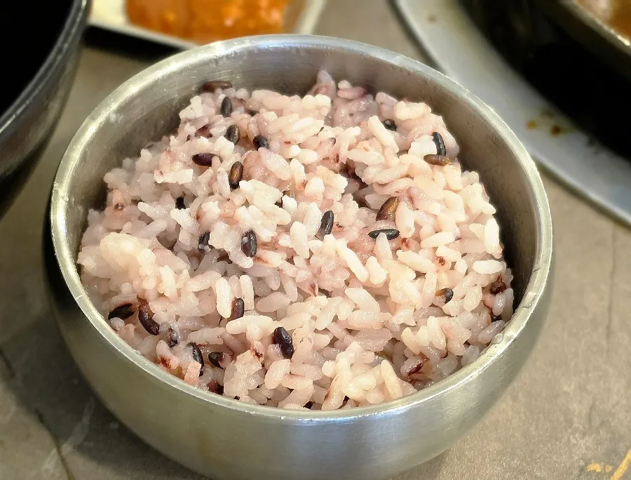 A bowl of hot, sticky black rice