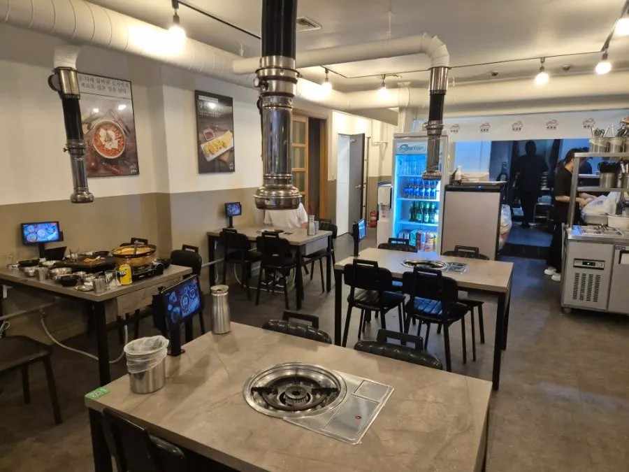 Wide dining hall view with group seating