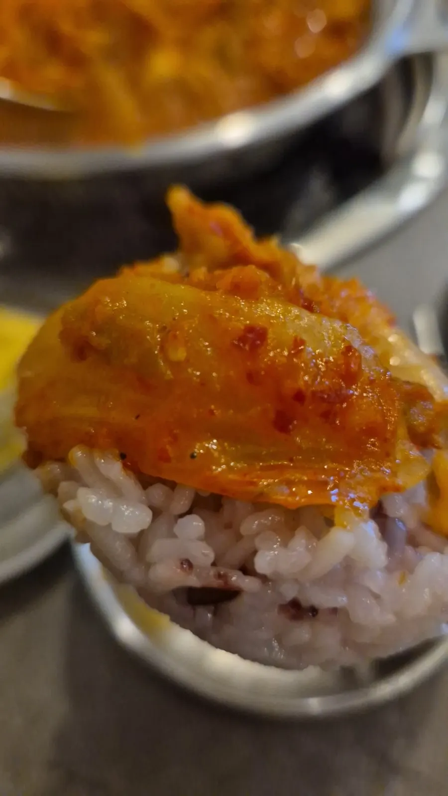 Pot of samgyeop kimchi jjim piled high with pork