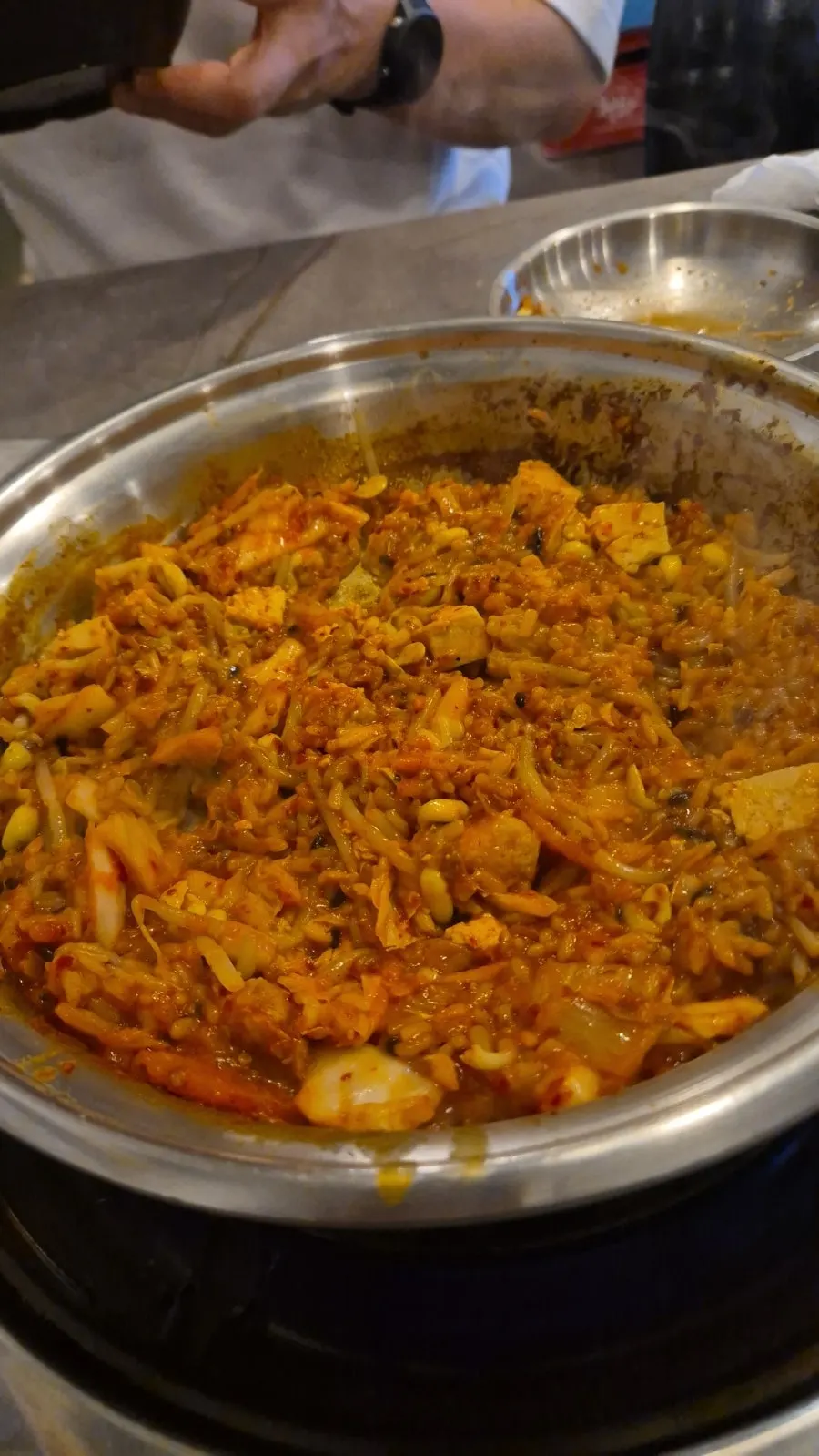 Bowl of rice topped with kimchi jjim