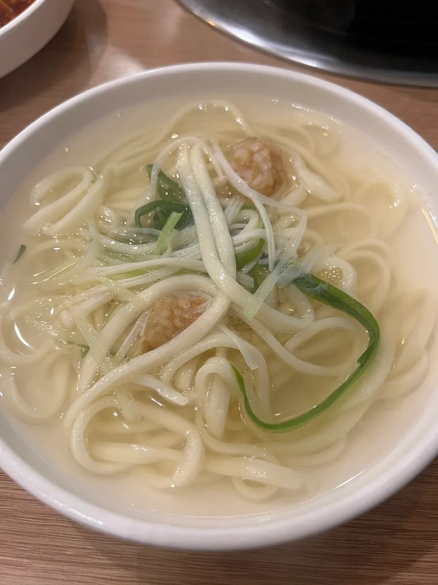 Pufferfish seafood kalguksu with seafood and clams