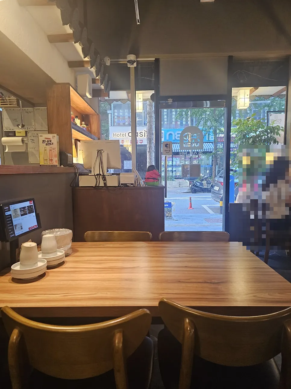 Seating with generous table spacing at the bar