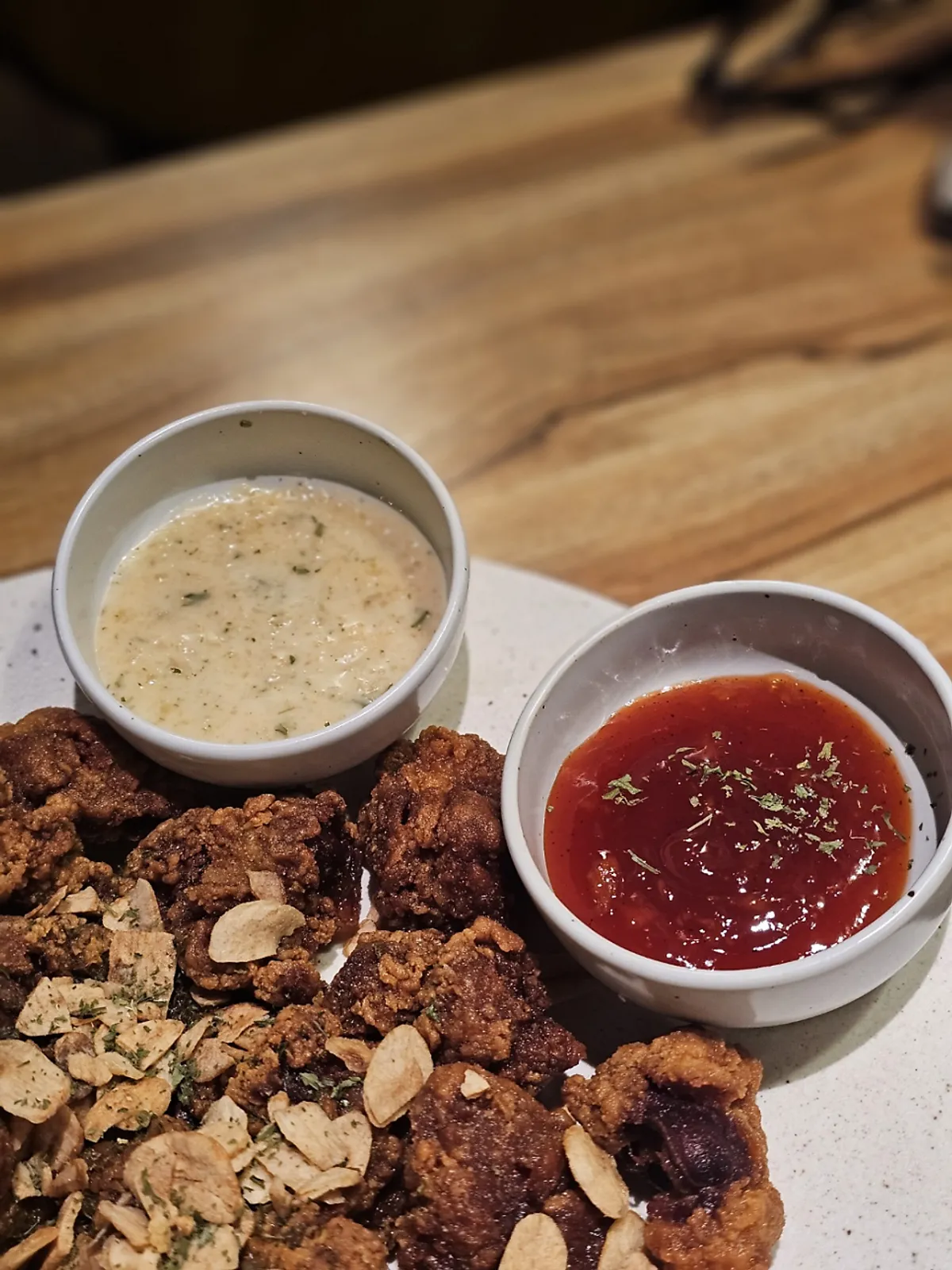 Fried chicken gizzards served with the special dipping sauce