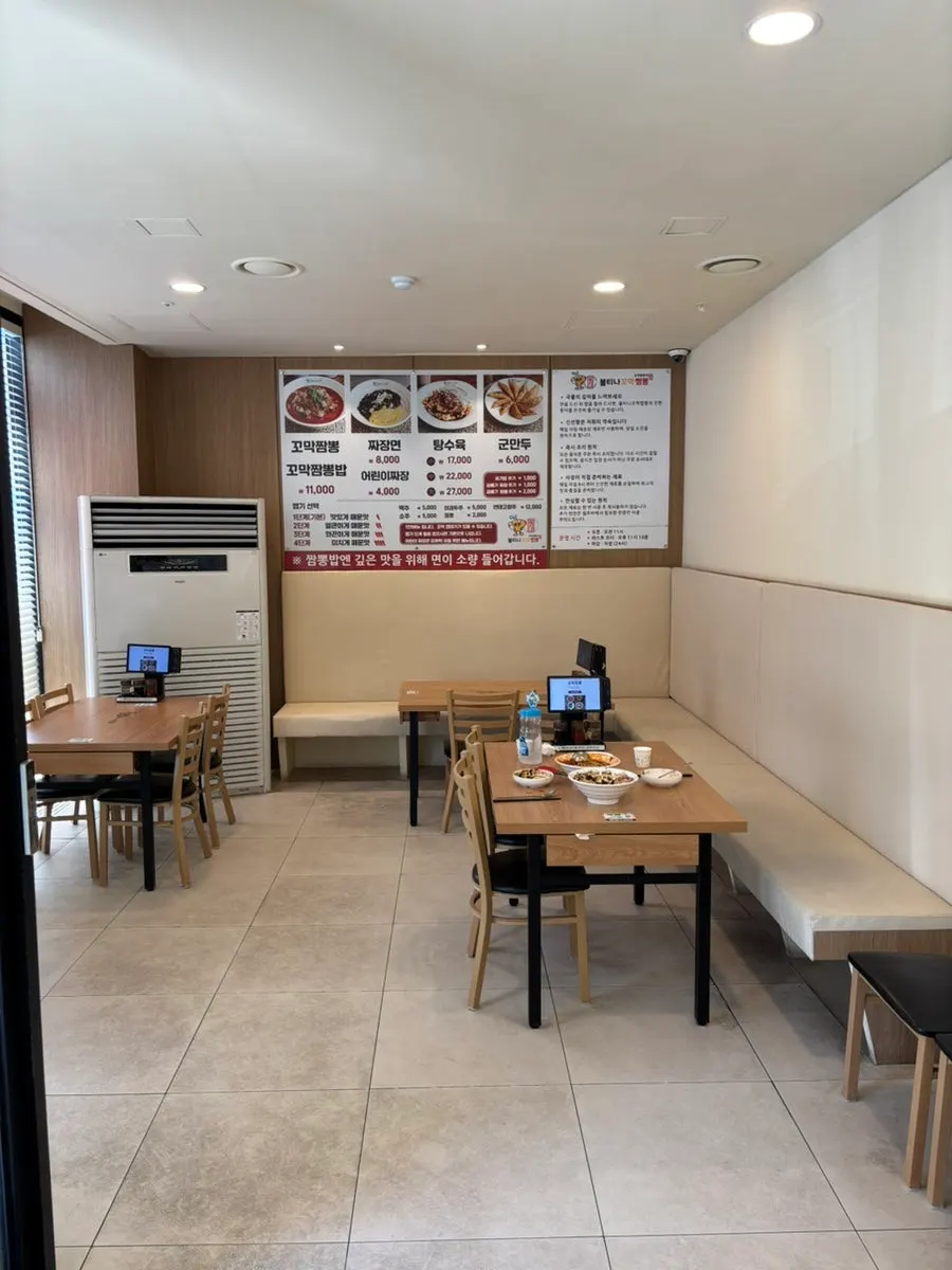Interior of the Chinese restaurant with wide table spacing